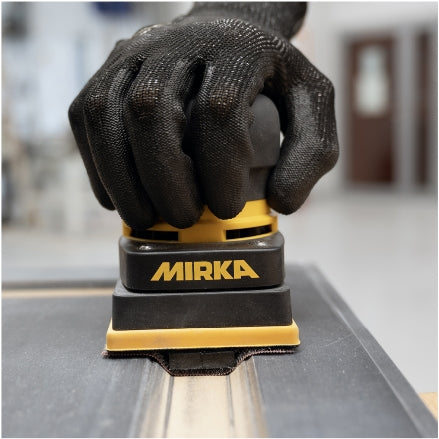 Mirka DEOS 3" x 4" sander with Groove Interface Pad in action, 3
